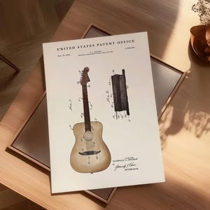May include: A vintage-style print of a guitar patent from the United States Patent Office. The print features detailed illustrations of a guitar and its components, with text including the inventor's name and patent information. The print is on a cream-colored background.