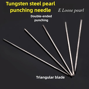 May include: Five tungsten steel pearl punching needles with triangular blades. The needles are double-ended and labeled "E Loose pearl" and "Double-ended punching".