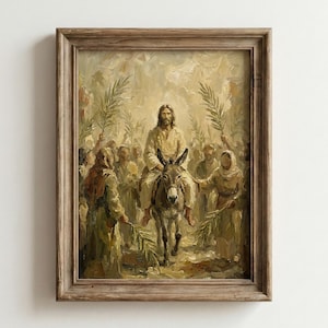 May include: A framed painting showing a religious scene. A figure with long hair rides a donkey, surrounded by people holding palm branches. The artwork uses warm, earthy tones and is set within a rustic wooden frame.