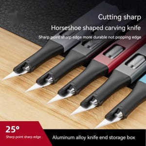 May include: A collection of horseshoe-shaped carving knives with sharp, angled blades. The knives have black handles with accents in gray, red, and blue. Text on the image reads "Cutting sharp" and "Aluminum alloy knife end storage box."