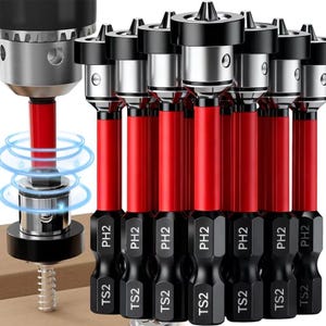 Może przedstawiać: Zestaw czarnych i srebrnych bitów do wkrętarki z czerwonymi trzpieniami. Bity są oznaczone "PH2" i "TS2". Obraz przedstawia również uchwyt wiertarski. Bity są przeznaczone do użytku z elektronarzędziami.