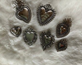 Set of 7 assorted sacred heart charms