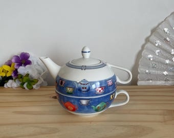 Vintage theepot en kopjesset, gemaakt in Japan, met blauw theekopjespatroon. 2-in-1 keramische theepot voor één persoon.
