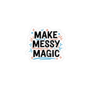 May include: A white sticker featuring the phrase "MAKE MESSY MAGIC" in black, blue, and orange. The text is surrounded by stars and colourful bursts, creating a playful and whimsical design.