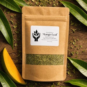 May include: A brown paper pouch containing dried cut mango leaves, featuring a white label with the text Present Body Co. Mango Leaf, Dried Cut Fruit Leaf, Single Botanical Tea Ingredient, Wildcrafted & Unsprayed, No Pesticides or Irradiation, Net Wt 1.02 (28g).