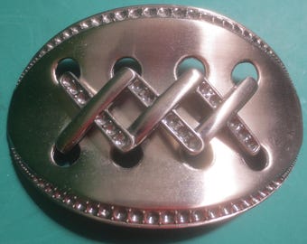 Brand New Brushed Stainless Steel Curved Oval X-Stitched Design Belt Buckle.