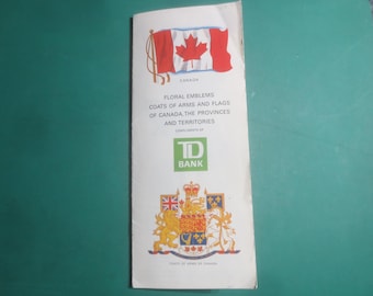 Folletos y panfletos con emblemas florales, escudos de armas y banderas del TD Bank Canada, de mediados de siglo.