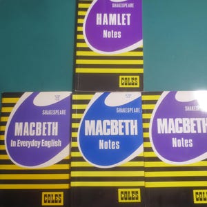 May include: Four paperback books with yellow and black horizontal stripes on the covers. The books are titled Shakespeare Hamlet Notes, Macbeth In Everyday English, and two copies of Macbeth Notes, all featuring the Coles brand logo at the bottom.