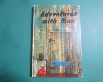 Libro infantil de aprendizaje escolar "Aventuras con Mac", edición vintage de 1967.