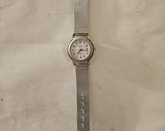 Timex Analog Wristwatch with a Buckle Band and Quartz Movement