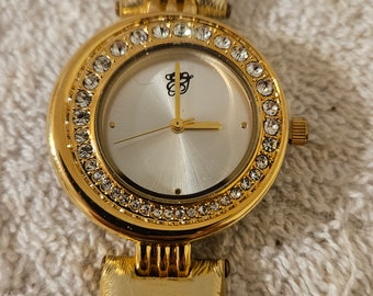 Elizabeth Taylor White Diamond Gold Tone Oval Rhinestone Bezel Dress Watch Elizabeth Taylor White Diamonds Watch Gold Toned Sparkly  main image 2