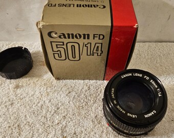 Near MINT Canon New FD 50mm f/1.4 MF Lens in box