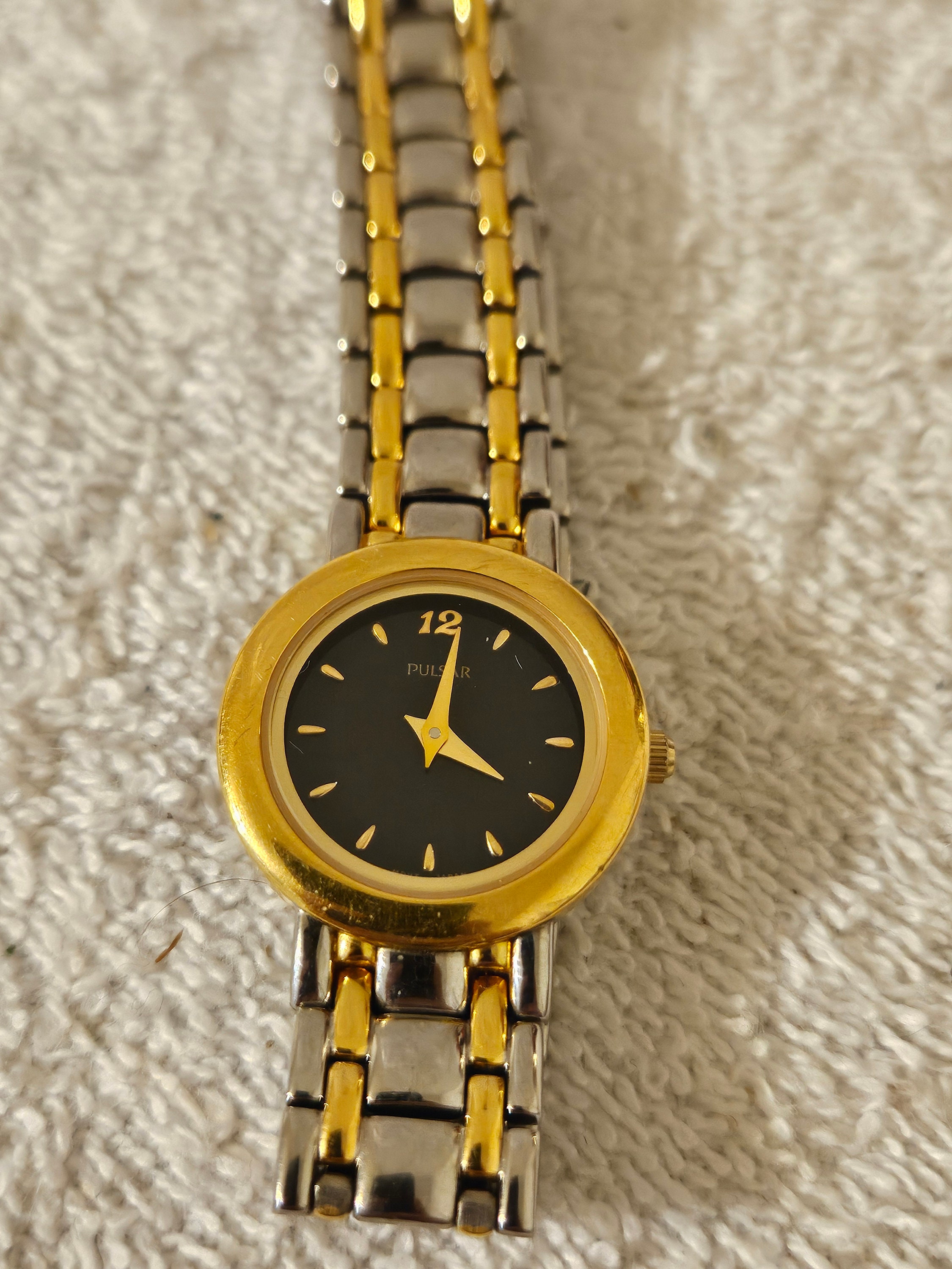 Pulsar ladies black dial octagonal silver tone watch NEW BATTERY Pulsar Two-Tone Steel 19mm Black Dial Ladies Quartz Watch main image 3