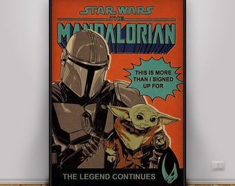 May include: Framed poster featuring characters from The Mandalorian. The poster has an orange background with the text "STAR WARS THE MANDALORIAN" at the top. The Mandalorian and Grogu are depicted. Text reads "THIS IS MORE THAN I SIGNED UP FOR" and "THE LEGEND CONTINUES."