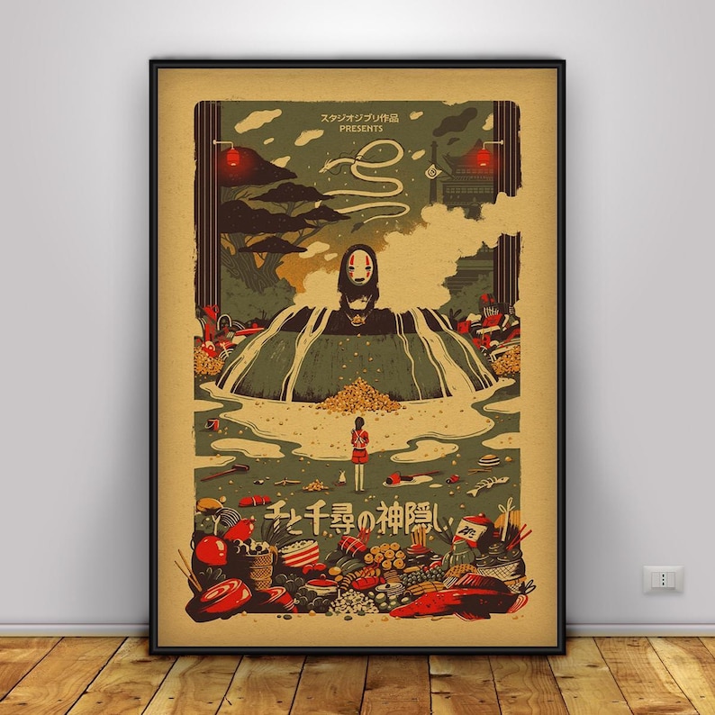 Op de afbeelding: Een ingelijste poster met een sc&egrave;ne uit een Japanse animatiefilm. Het kunstwerk toont een gemaskerde figuur in een landschap met water, voedsel en personages. Japanse tekst is onderaan zichtbaar. De poster zit in een zwarte lijst.