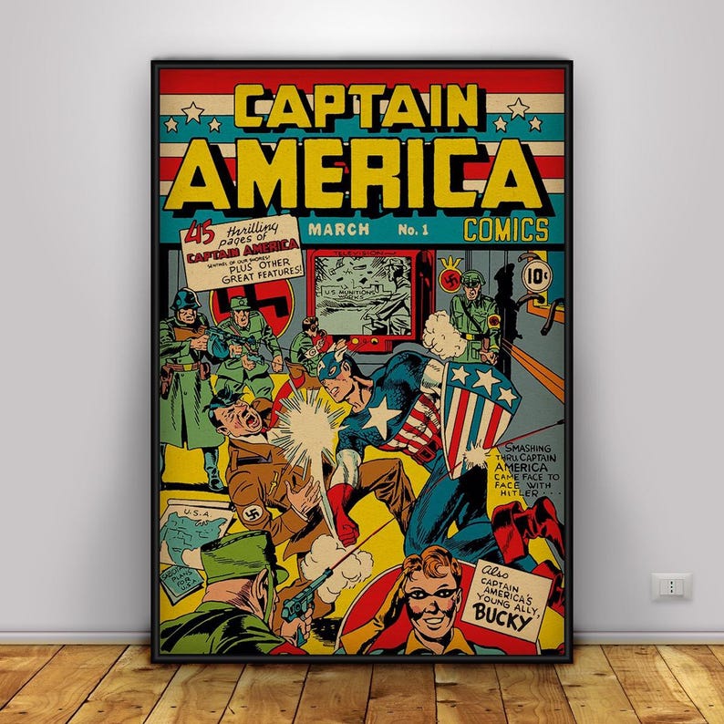May include: A framed vintage Captain America comic book cover. The artwork features Captain America in action, with bold text reading "CAPTAIN AMERICA" in yellow and blue. The comic is set against a red, blue, and yellow background, with soldiers and a map of the USA.