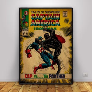 May include: A framed comic book cover featuring Captain America and Iron Man. The cover art shows Captain America in a fight with the Black Panther. The title reads "Tales of Suspense" and "Captain America and Iron Man". The comic book is framed in a black frame.