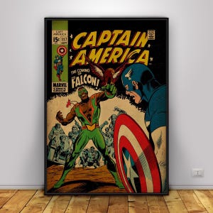 May include: A framed vintage comic book cover featuring Captain America and The Falcon. The artwork showcases a dynamic battle scene with vibrant colors, including red, blue, green, and yellow. The title "Captain America" is prominently displayed.