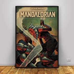 May include: A framed poster with a Star Wars: The Mandalorian comic-style illustration. The artwork shows two figures in combat, one with a lightsaber. The poster has a vintage aesthetic with a green and brown colour scheme.