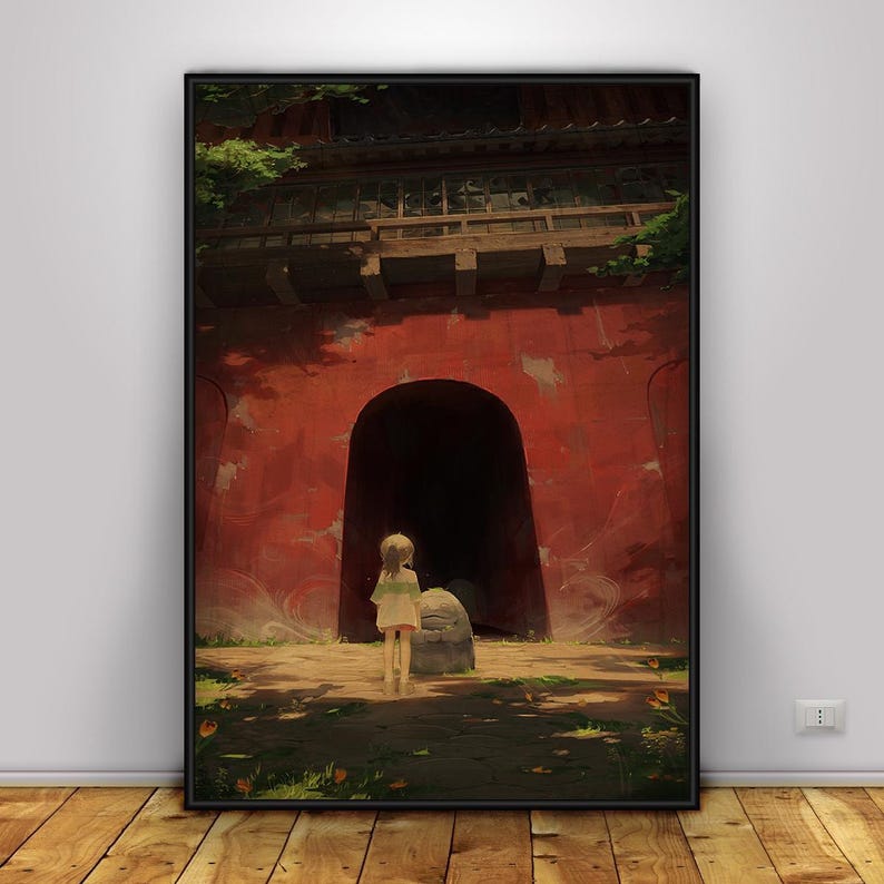 May include: A framed art print depicting a young person in a white dress standing before a large, red arched doorway. The artwork has a fantasy theme, with a stone and foliage in the foreground.