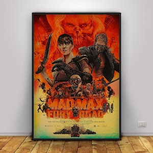 May include: A framed poster for the movie "Mad Max: Fury Road." The poster features a fiery orange and red background with characters from the film. The title "Mad Max Fury Road" is prominently displayed at the bottom.