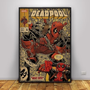 May include: A framed comic book cover featuring Deadpool in a dynamic pose, holding a gun and a knife. The artwork is predominantly red and black, with the title "DEADPOOL" in large yellow letters. The comic is labeled "MEAT CUTE".