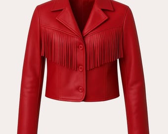 May include: A bright red cropped jacket featuring a notched lapel collar, long sleeves, and a front button closure. The upper chest area is adorned with a horizontal row of long, matching red fringe detailing that extends across the front panels.