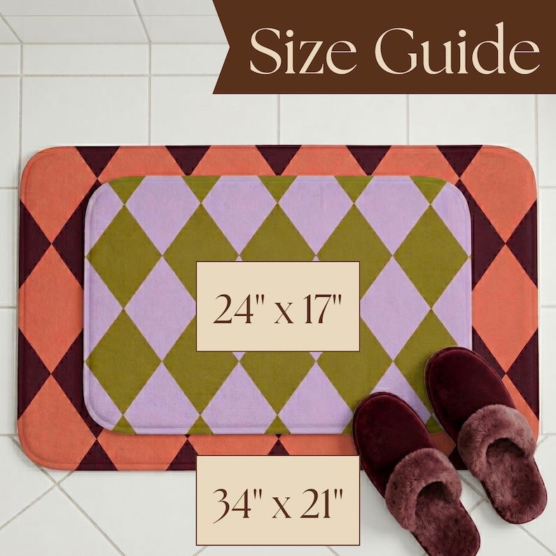 May include: A rectangular bath mat with a lavender and olive green diamond pattern, layered over a larger mat with a coral and dark maroon diamond pattern. Text labels indicate sizes of 24 inches by 17 inches and 34 inches by 21 inches.