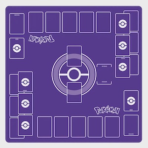 May include: A purple playmat for a card game with a white design. The mat features spaces for cards, a central game area, and the word "Pokemon" in white. The design includes areas for decks, prizes, and discard piles.