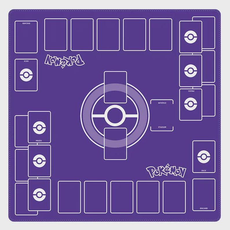 May include: A purple playmat for a card game with a white design. The mat features spaces for cards, a central game area, and the word "Pokemon" in white. The design includes areas for decks, prizes, and discard piles.