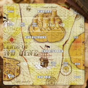 May include: A One Piece card game playmat featuring a map design with various game zones labeled "Character Area," "Cost Area," and "Deck." The mat has a vintage, parchment-like appearance with illustrations of a ship and island.
