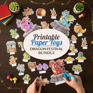 May include: A collection of colorful printable paper toys featuring dragons, a drum, and a market stall. The text "Printable Paper Toys DRAGON FESTIVAL BUNDLE" is displayed on an oval-shaped sign. A pair of scissors is cutting a red dragon.
