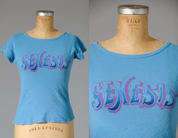 1970s Genesis T Shirt Baby Blue and Pink Cap Sleev