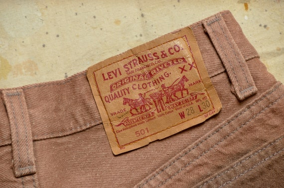 1980s Levis Sun Faded Brown Denim 501 Made in USA Jeans 28 x 31