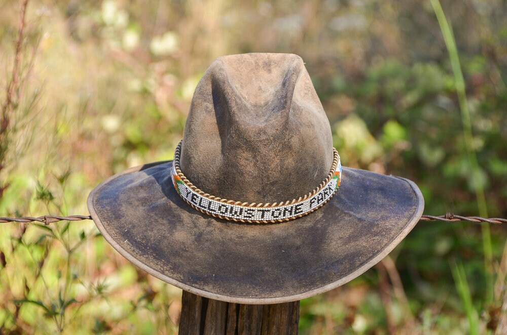 Vintage Distressed Western Hat with Beaded Yellowstone Park Hat Band