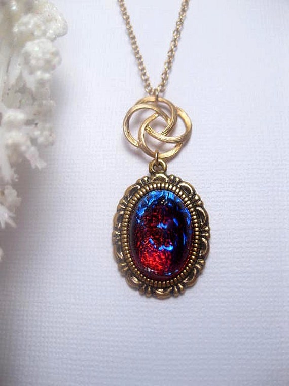Dragons Breath Opal Necklace With Gold Swirl Pendant Etsy Dragons Breath Opal Necklace With Gold Swirl Pendant Etsy