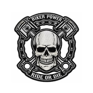 May include: A black and white patch featuring a skull with crossed pistons and a chain. The text "BIKER POWER" arches above the skull, and "RIDE OR DIE" is below. The design is detailed and bold.