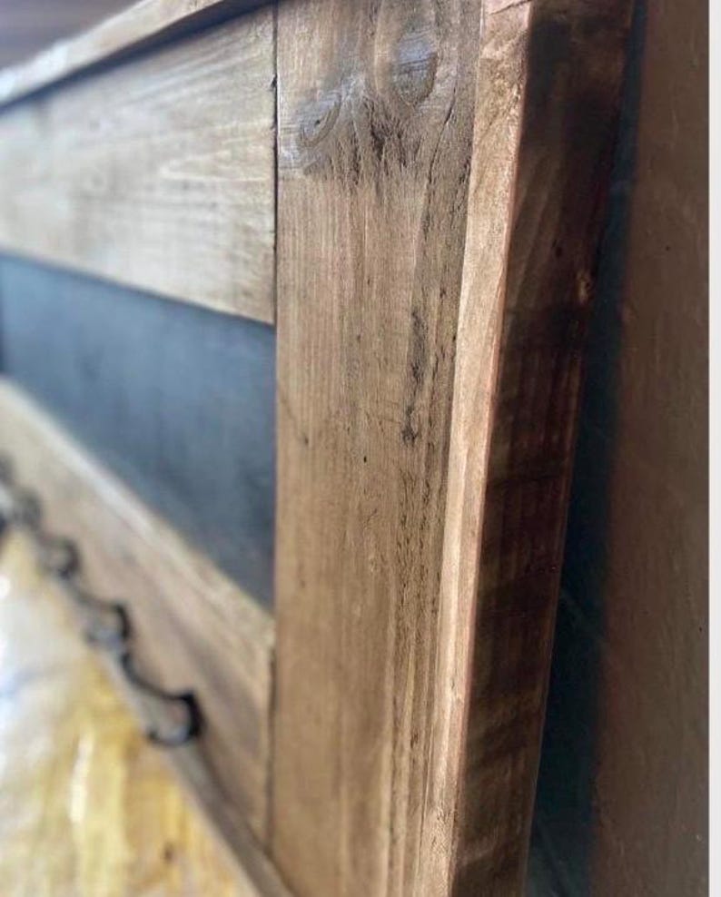 Close view of the blackboard and key hooks