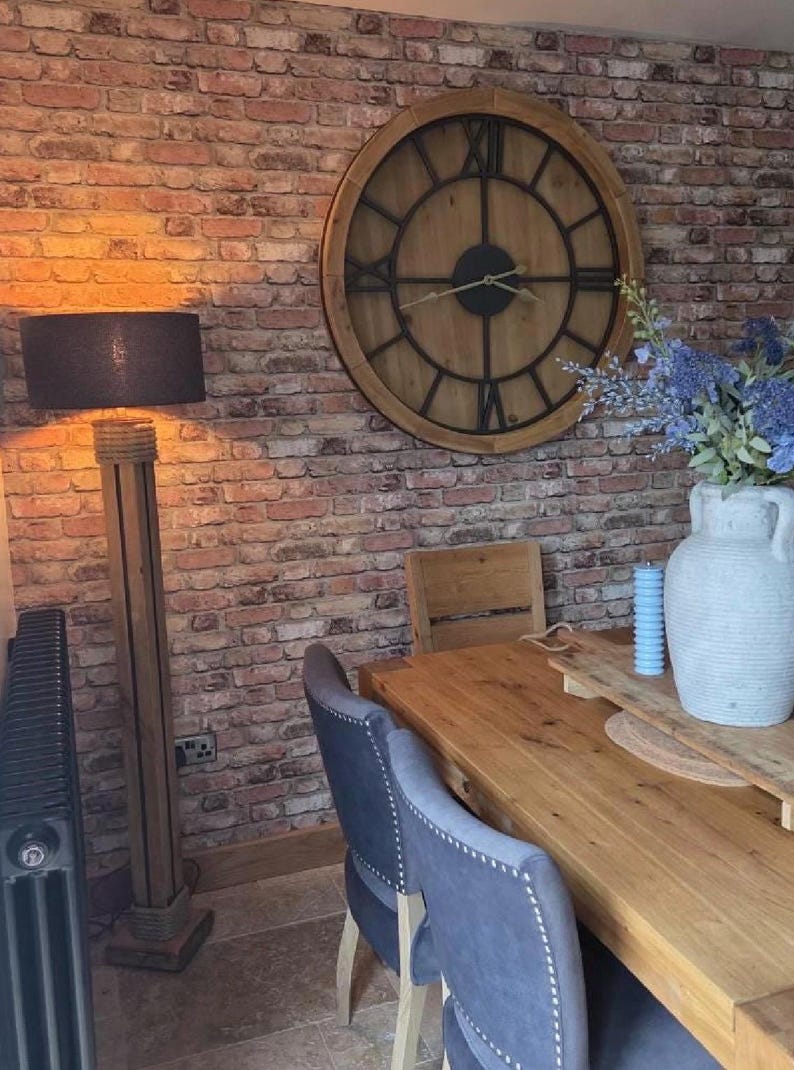 Reclaimed wood floor lamp styled in a room