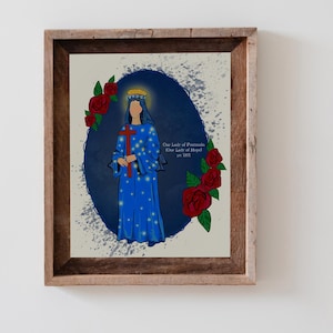 May include: Two framed prints featuring illustrations of a religious figure in a blue gown, holding a cross, surrounded by red roses. The figure is set against a blue oval background with text. The frames are made of wood.