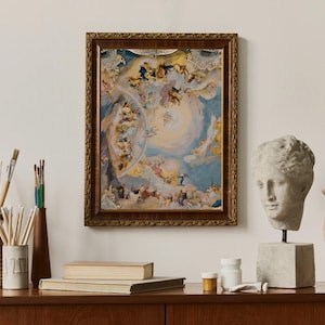 May include: A framed artwork with a detailed, colorful depiction of figures in a celestial scene hangs above a wooden cabinet. A plaster bust, wooden hand model, and art supplies, including paintbrushes and paint jars, are arranged on the cabinet.