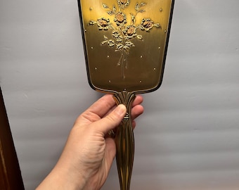 Espejo de tocador con relieve floral