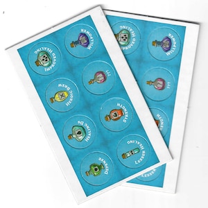 May include: Two sheets of circular stickers with potion bottle designs in various colours. Each sticker has a different label, such as "Healing," "Strength," and "Willpower." The background is a textured blue.