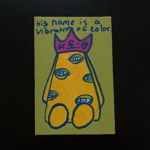 May include: A yellow figure with a pink crown and multiple blue eyes on a green background. The text "His name is a vibration of color." is written above the figure.