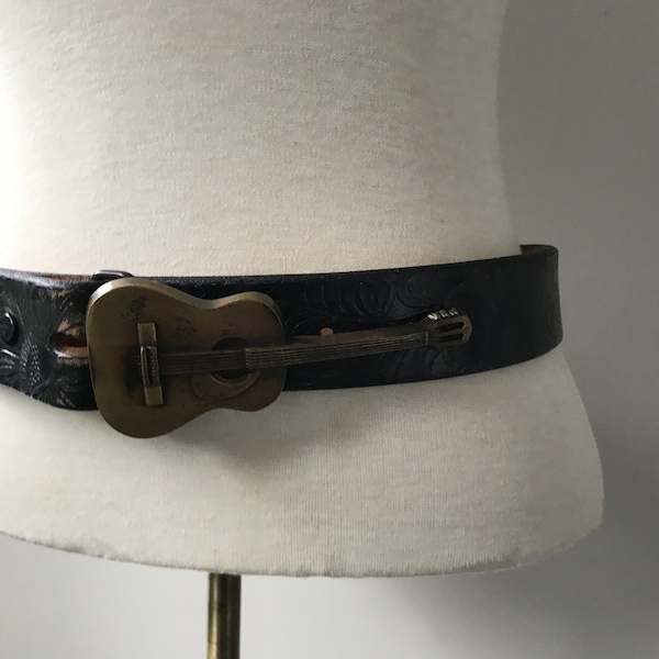 Vintage belt with solid brass violin buckle.