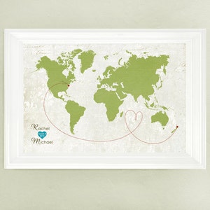 May include: A green world map with a red line connecting two red heart pins. The line forms a heart shape. The text "Rachel & Michael March 8, 2013" is below the map.