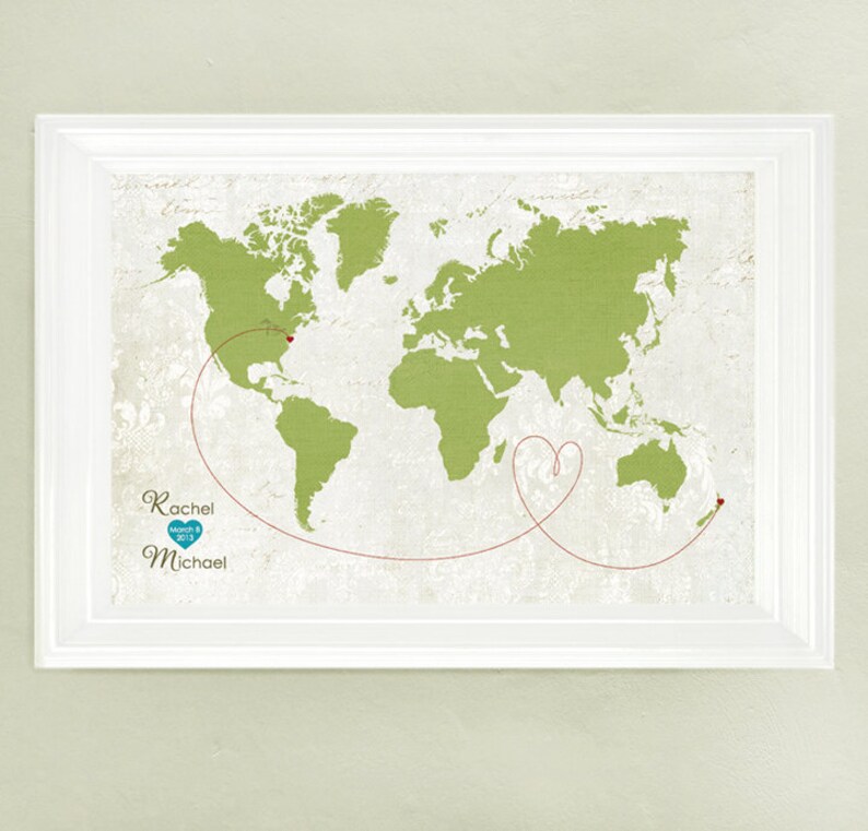 May include: A green world map with a red line connecting two red heart pins. The line forms a heart shape. The text "Rachel & Michael March 8, 2013" is below the map.