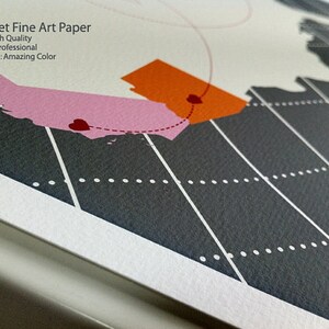 May include: A close-up of a gray and white map with two pink and orange shapes. The shapes are connected by a dotted line with a red heart at each end. The text "Velvet Fine Art Paper" is at the top of the image. The text "High Quality", "Professional", and "Amazing Color" are listed below the title.