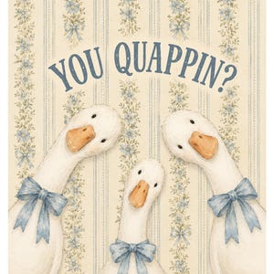 May include: A decorative print featuring three white geese with orange beaks, each wearing a light blue ribbon bow around its neck. The background displays a cream-colored wallpaper pattern with vertical blue stripes and floral vines. Text reads: YOU QUAPPIN?