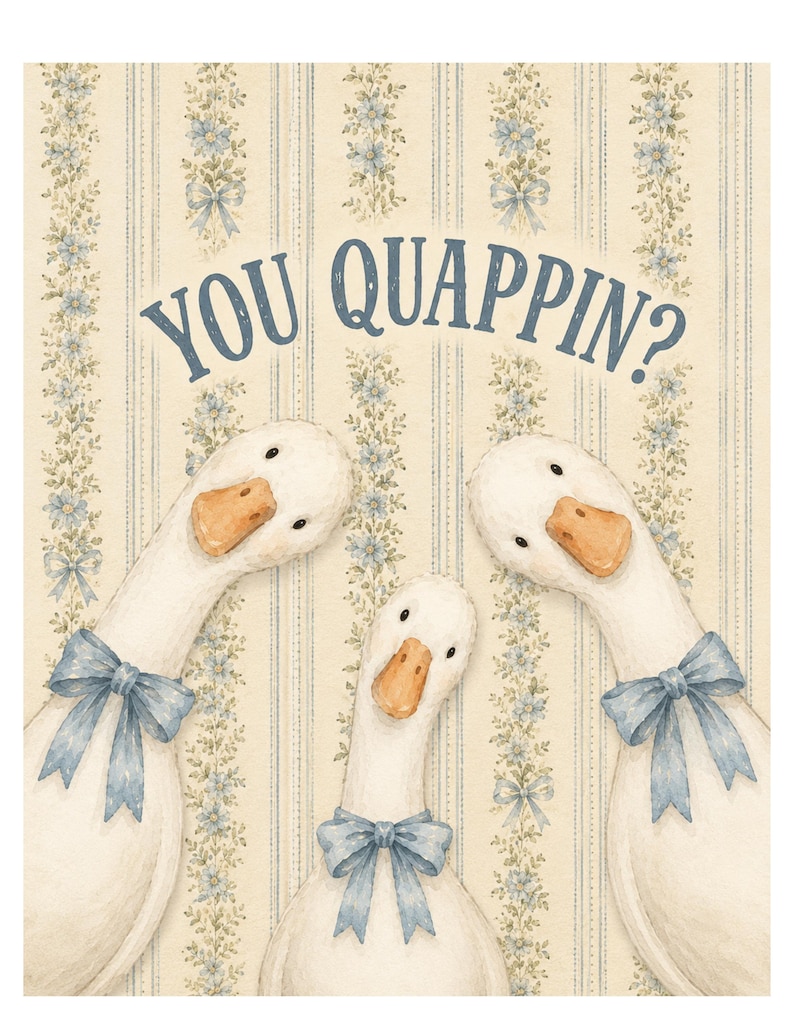 May include: A decorative print featuring three white geese with orange beaks, each wearing a light blue ribbon bow around its neck. The background displays a cream-colored wallpaper pattern with vertical blue stripes and floral vines. Text reads: YOU QUAPPIN?